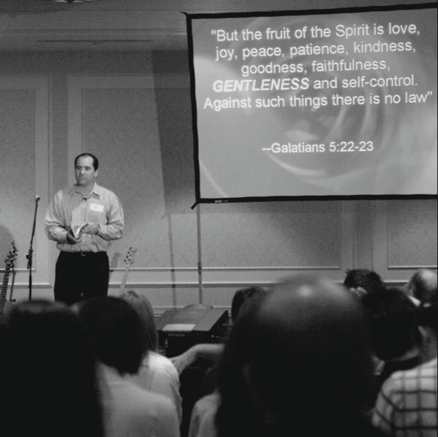 Bible study speaker presenting at Rolling Hills Community Church.